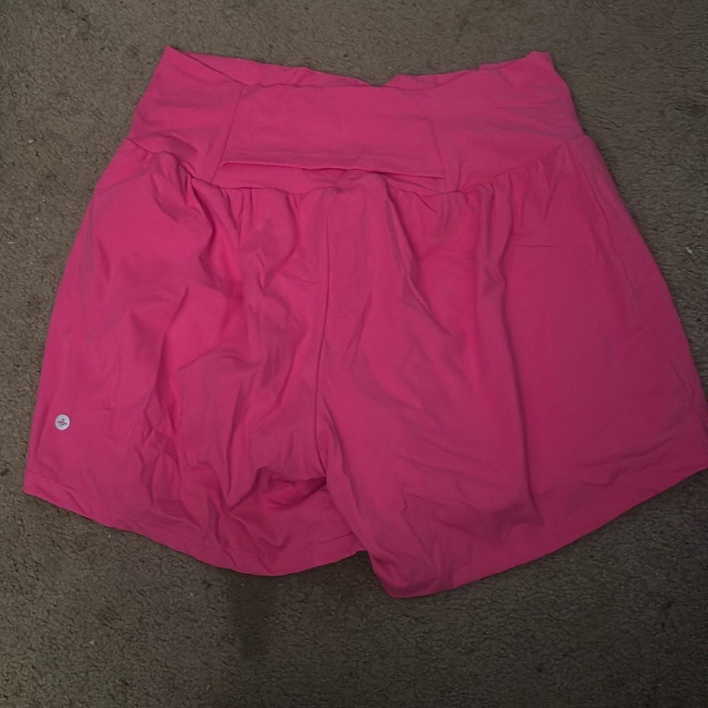 Halara pink workout shorts